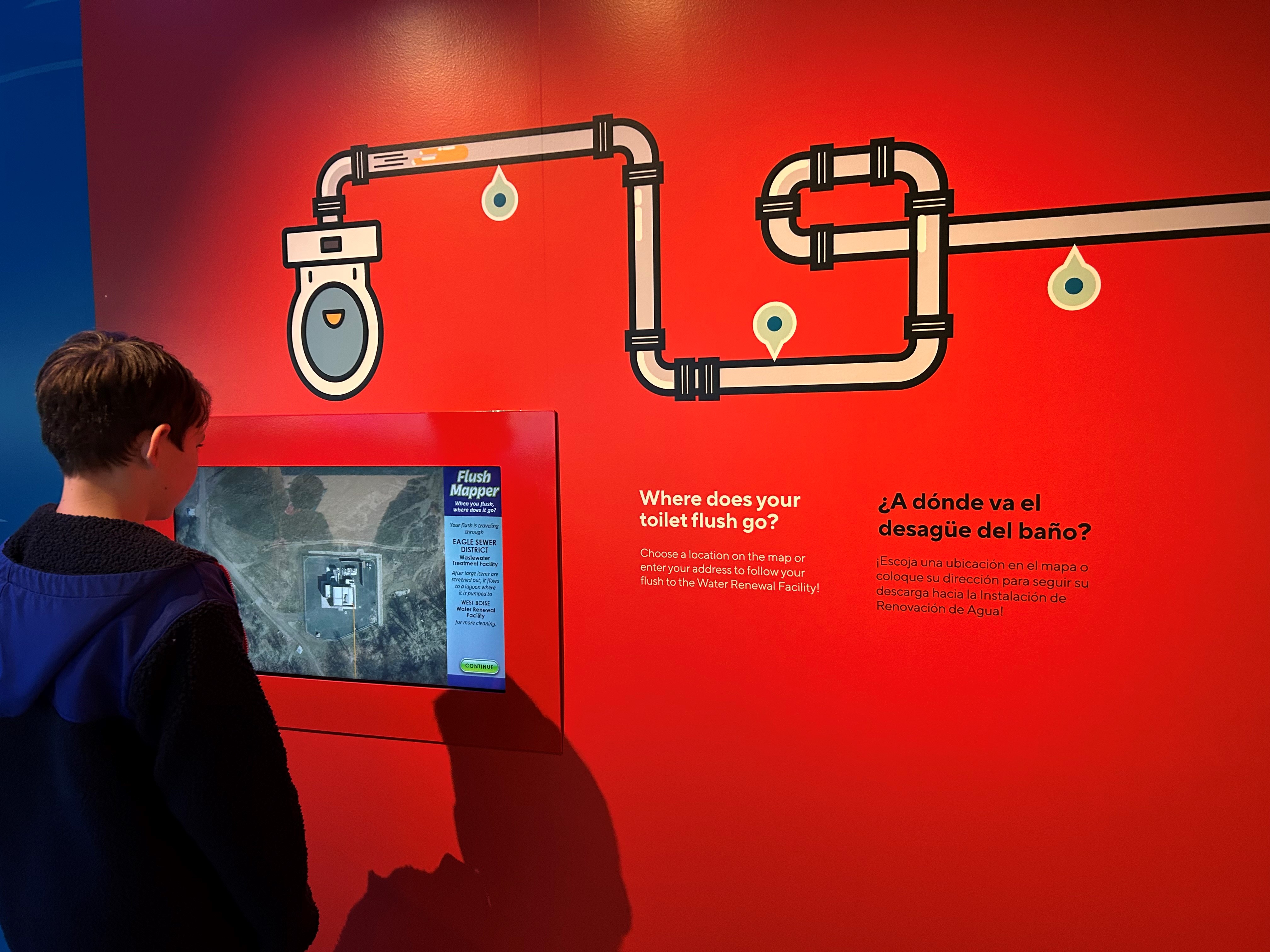 A student reading an exhibit.
